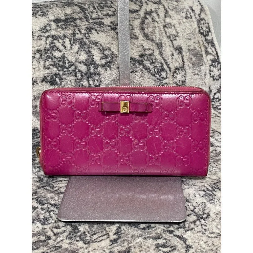 Gucci Guccissima Bow Zip Around Long Wallet in Fuschia
